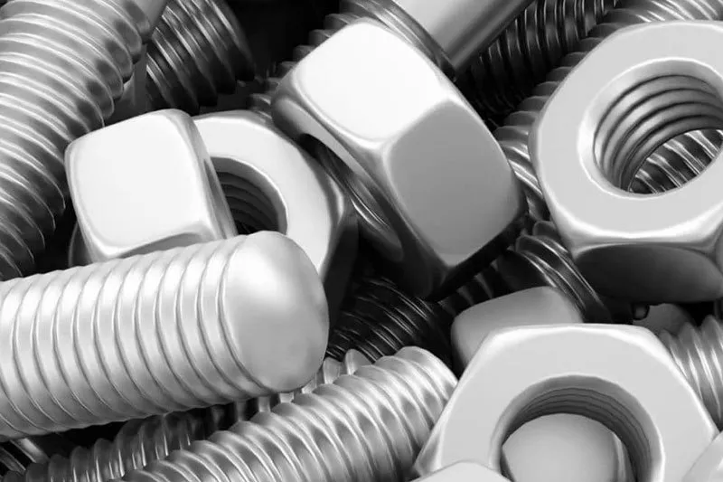 What is the difference between a hex nut and a Nyloc nut?
